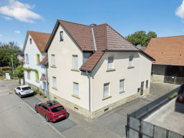 Bild - Grundstück mit einem 2-Familienhaus, Scheune und vielseitigem Potenzial