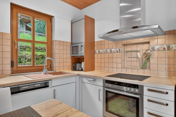 Küche - Einfamilienhaus in Hanglage mit Kaminofen